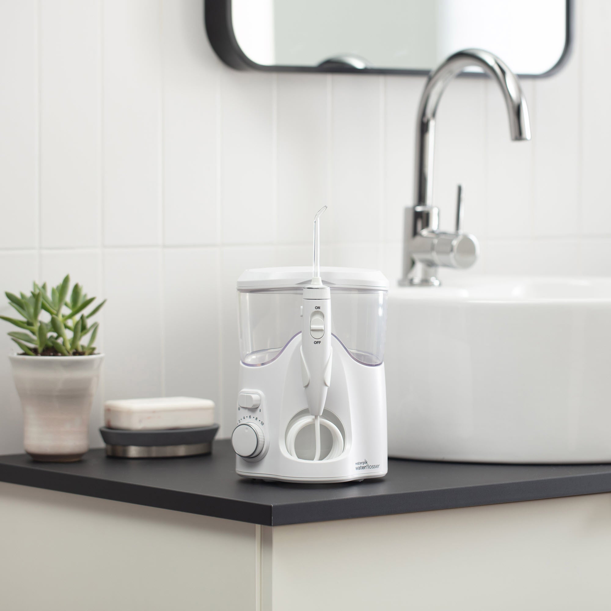 Waterpik Ultra Plus and Cordless Pearl Water Flosser Combo Pack